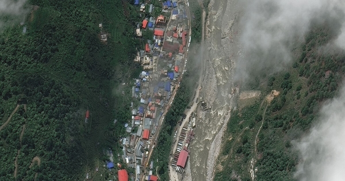 A satellite image shows buildings and roads before flash floods and a mudslide, in Timure, Nepal, July 1, 2026. Vantor/Handout via REUTERS
